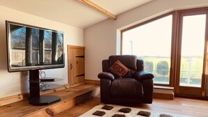 Baita Luxury, bagno privato | Area soggiorno