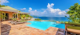 Exceptional design, spacious covered decks, super views, set in Long Bay Estate