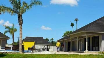 Outdoor pool, pool umbrellas, pool loungers