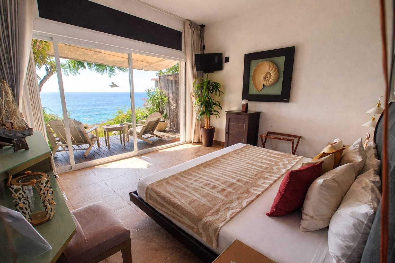 Habitación exclusiva, 1 cama King size, para fumadores, vista al mar | Sábanas de algodón egipcio y ropa de cama de alta calidad 