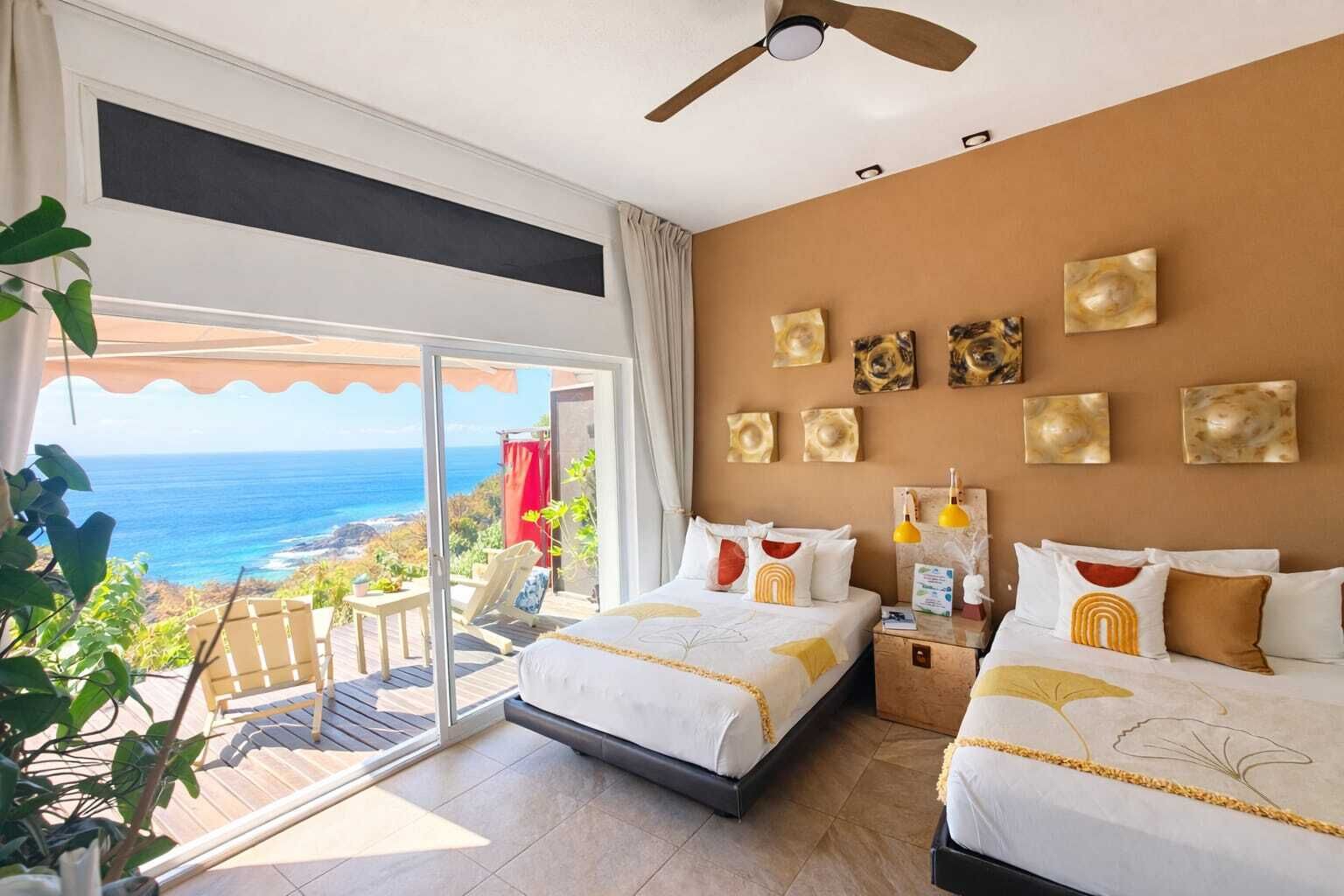 Habitación cuádruple Deluxe | Sábanas de algodón egipcio y ropa de cama de alta calidad 