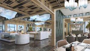 A modern hotel lobby with a central reception desk, seating areas, and large windows offering views. - Radisson Suzhou (Suzhou)