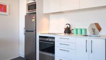 Apartment | Private kitchen | Fridge, microwave, oven, stovetop
