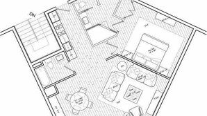 A floor plan of a hotel with a central dining area, multiple bedrooms, and a bathroom. - The Anna Maria Luxury Suite Apartment 1 (Holmes Beach)