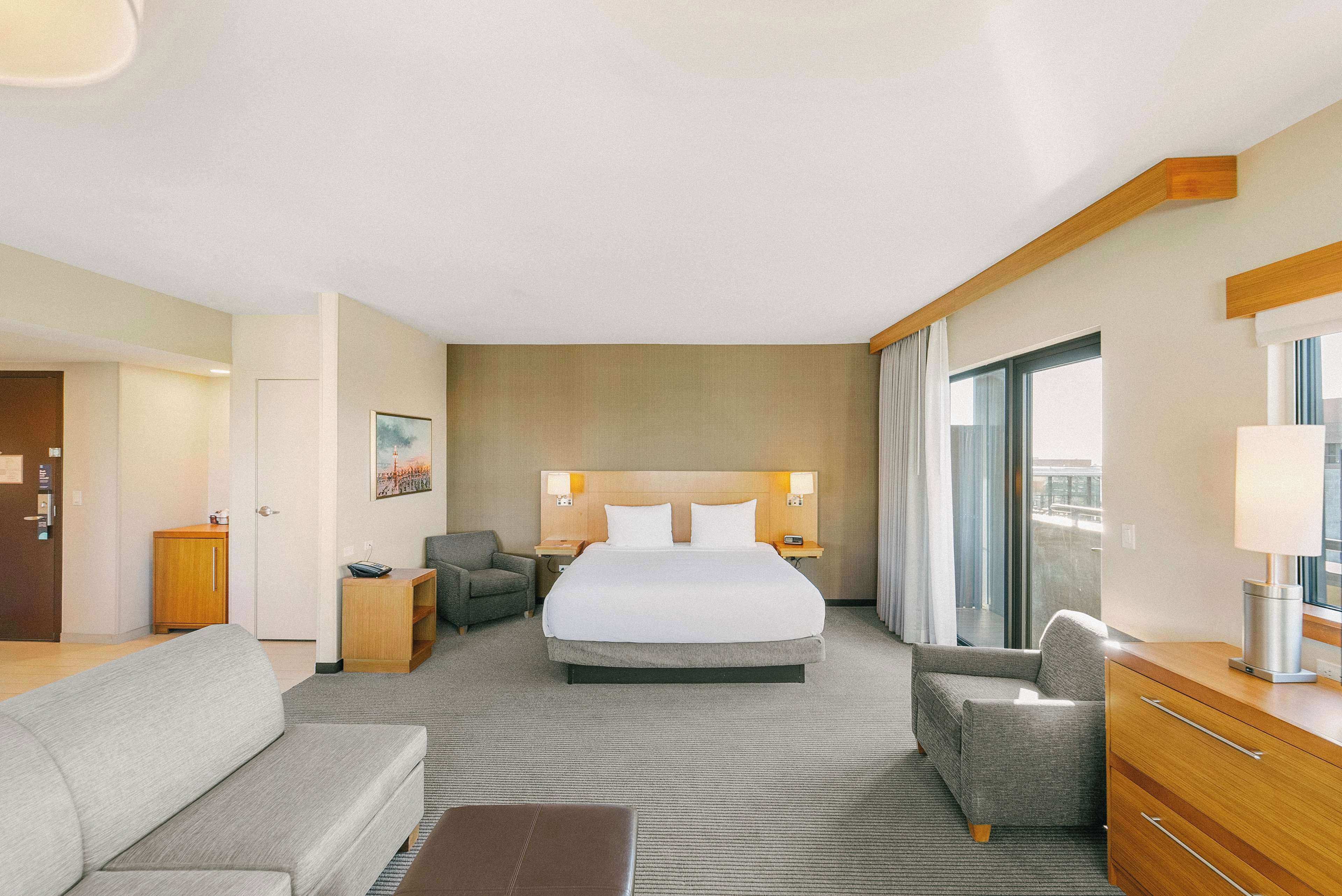 room, 1 king bed with sofa bed (specialty) | in-room safe, desk, blackout curtains, iron/ironing board