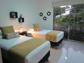 Family Villa, Multiple Beds, Non Smoking, Garden View | 2 bedrooms, in-room safe, blackout drapes, iron/ironing board