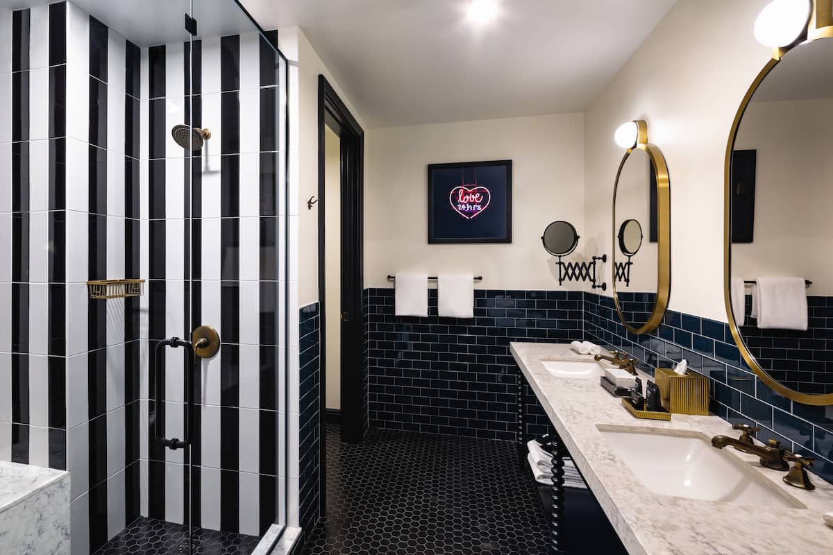 Shower, rainfall showerhead, designer toiletries, hair dryer