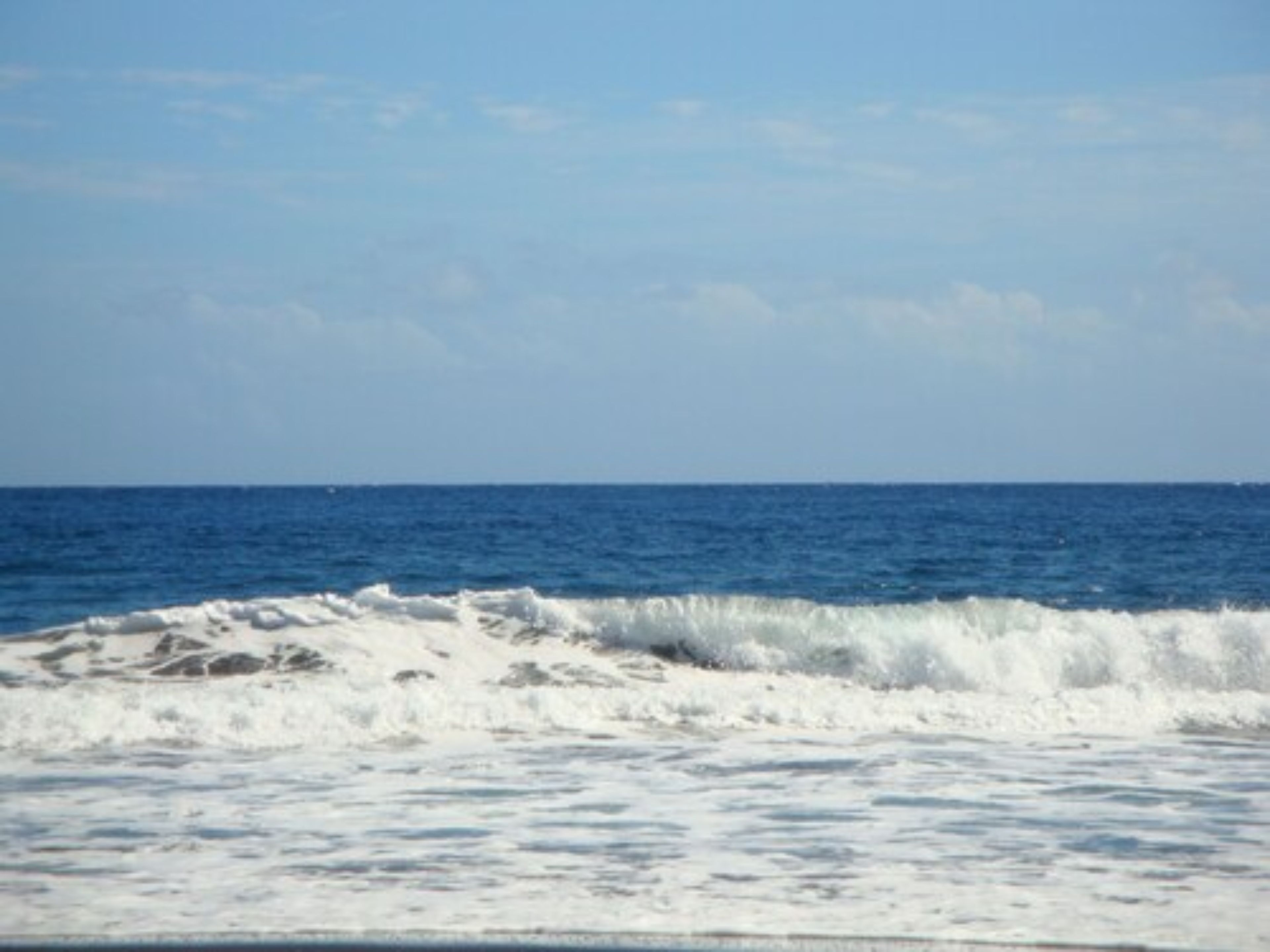 on the beach, black sand
