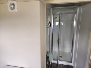 Bathtub, hair dryer, towels, soap
