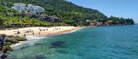 On the beach, sun loungers