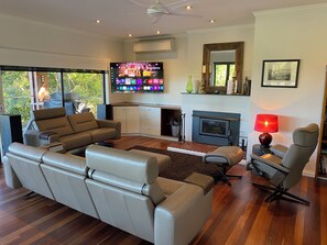 Smart TV, fireplace, Netflix, books