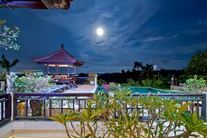 A gazebo with a tiled roof, a swimming pool, and surrounding greenery. - Villa Rama Rama – A Huge Private Hilltop Spa Retreat with Stunning Views (Balangan)