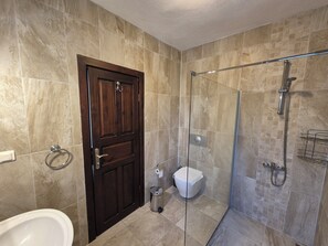 Shower, hair dryer, towels, soap