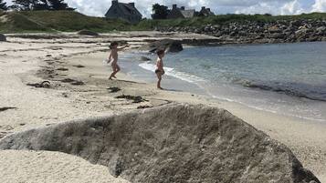 On the beach, sun loungers