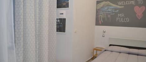 2 dormitorios, tabla de planchar con plancha, wifi y ropa de cama