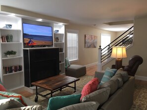 Smart TV, fireplace, books