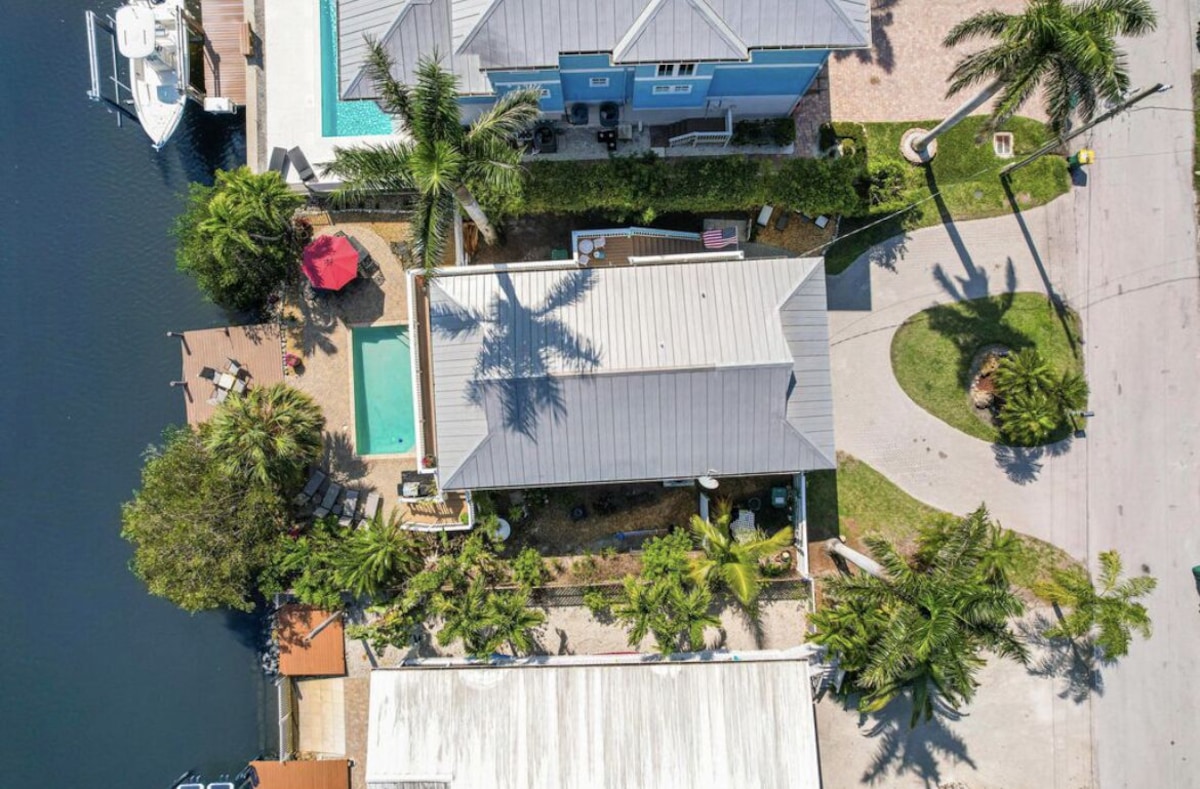 Photo 39 of 3BED 3BATH Tropical Paradise WATERFRONT POOL HOUSE On Canal 1 mile to the BEACH!