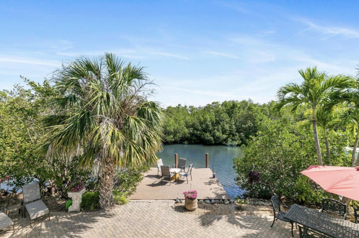 Photo 32 of 3BED 3BATH Tropical Paradise WATERFRONT POOL HOUSE On Canal 1 mile to the BEACH!