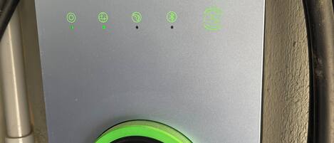 A grey control panel with the brand name "AUTEL" and a green power button.