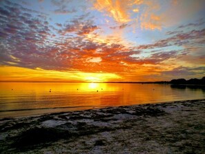 On the beach, sun loungers, beach towels - "Legasea," Old Florida Beachfront Charm with Two Screen Porches, Sleeps 7 (Panacea)