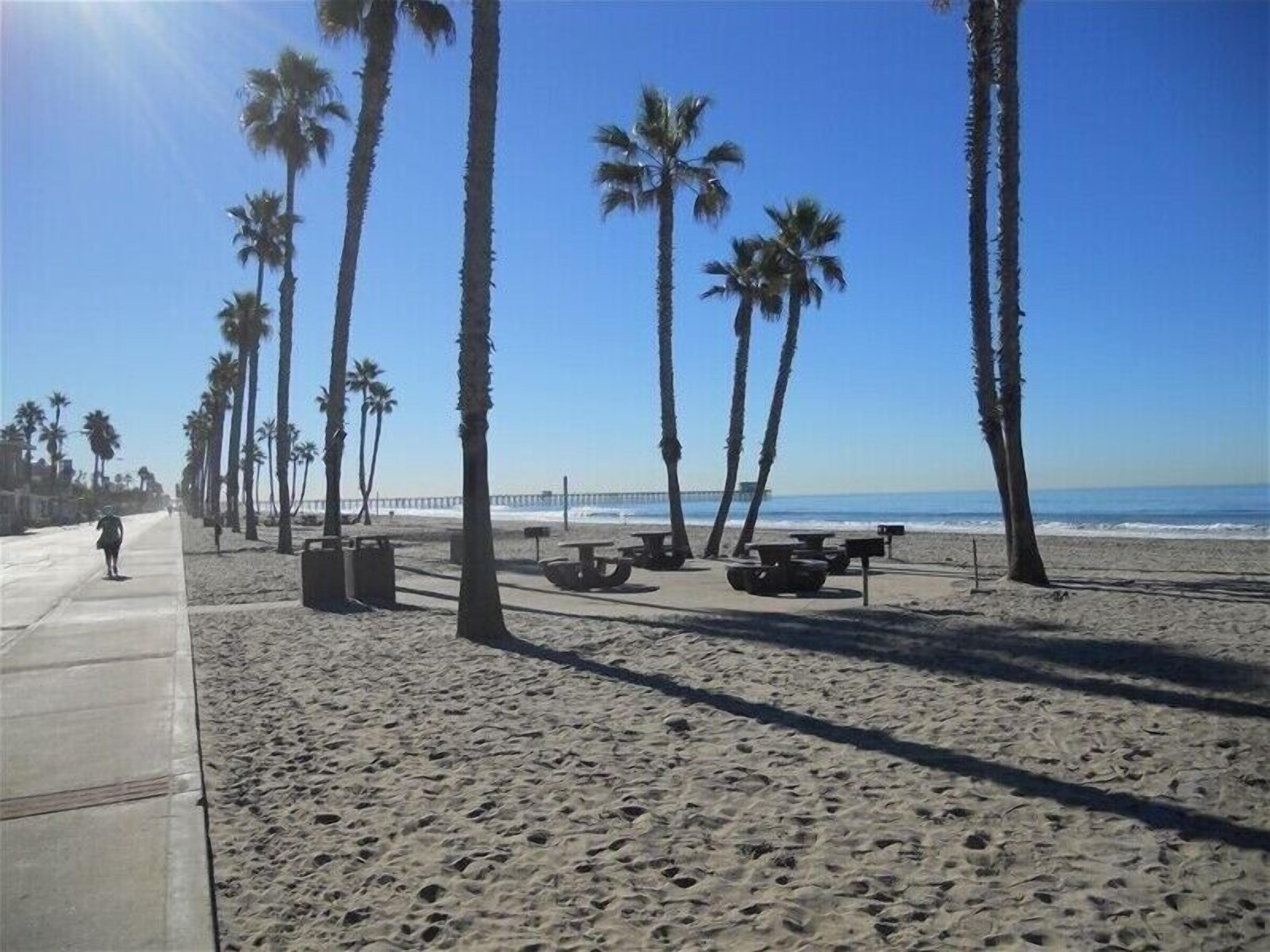 Boardwalk to the Pier for biking and walking steps away ..