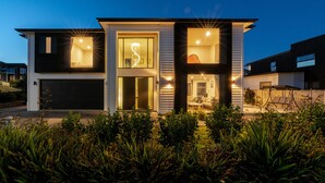 Front of property - evening/night - LongBay Spacious Luxurious 5 Bdrm House (Auckland)