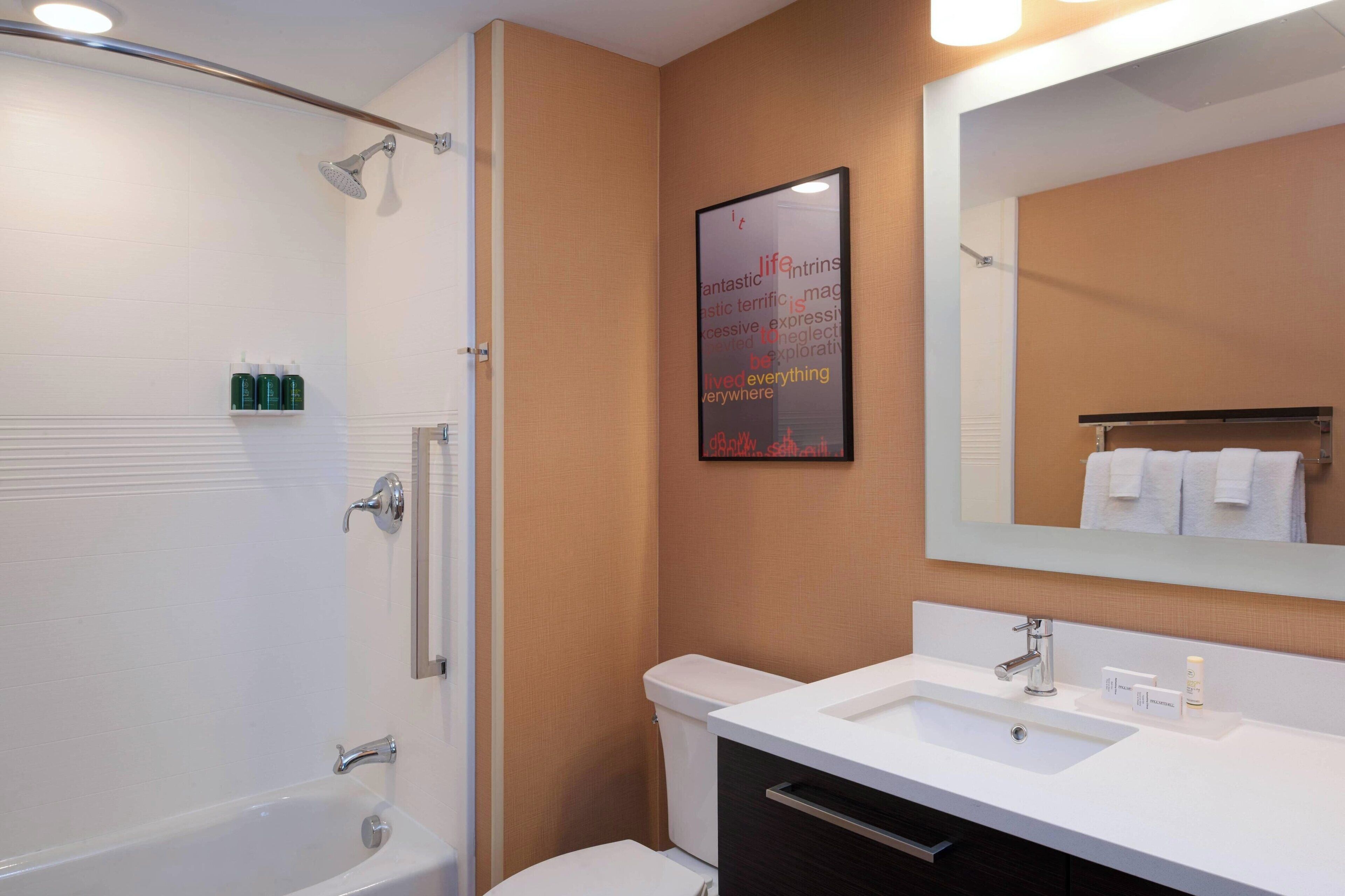 studio, 2 queen beds | bathroom | free toiletries, hair dryer, towels