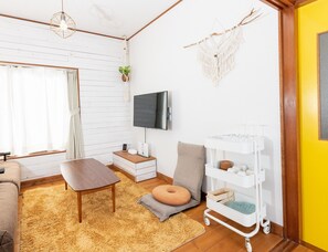 Apartament bàsic | Sala d'estar | Televisor de pantalla plana 