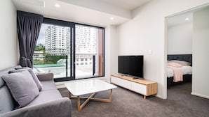 49-inch flat-screen TV with digital channels, TV - Brand New Apartment on Anzac Ave (Auckland)