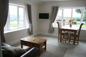 Cottage, 1 Bedroom (Silver Birch) | Living area | 34-inch flat-screen TV with digital channels, TV, DVD player