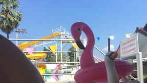 A pink flamingo decoration and a stack of colorful rings. - Aiem Sa Ard Resort (Koh Lan)