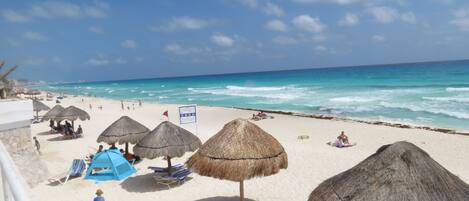 On the beach, sun loungers
