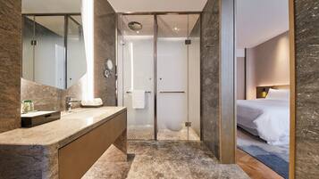 Room, 1 King Bed (Renewal Room, World Expo City View) | Bathroom | Separate tub and shower, free toiletries, hair dryer, bathrobes