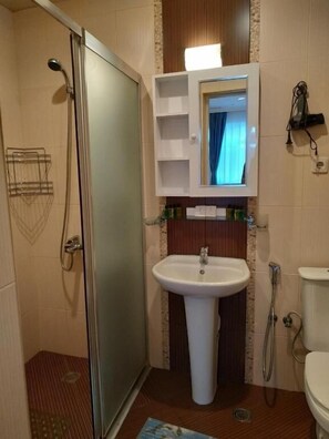 Basic Double Room, Garden View | Bathroom | Hair dryer, slippers, towels, soap