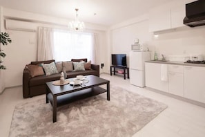 Appartement | Woonruimte | Een flatscreentelevisie