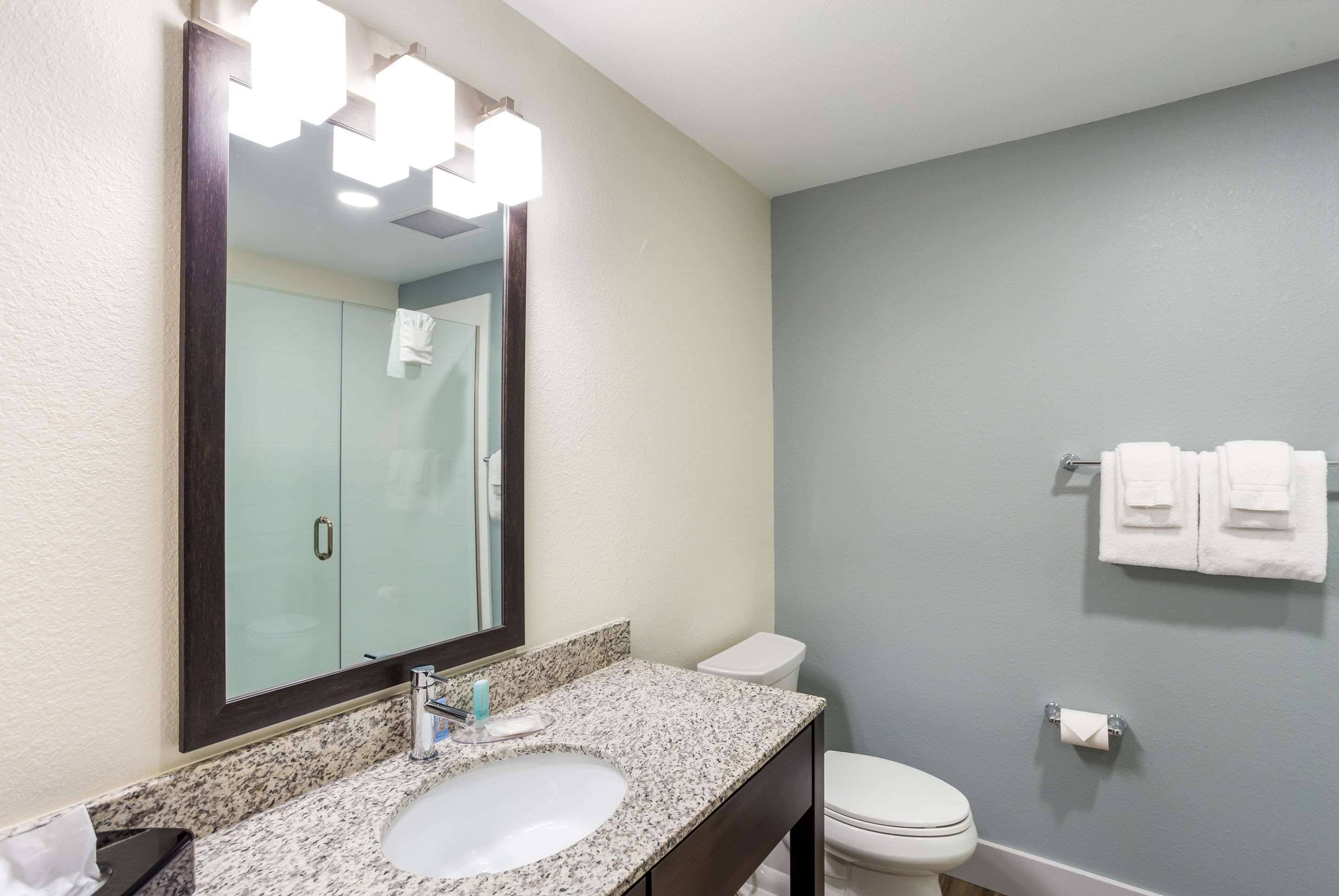 suite, 2 queen beds, non smoking | bathroom | rainfall showerhead, free toiletries, hair dryer, towels
