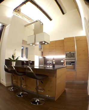 Réfrigérateur dans l'espace commun, micro-ondes dans l'espace commun