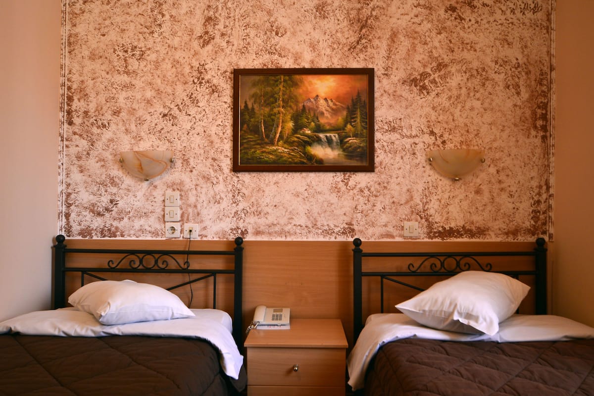 Economy Room | Soundproofing, iron/ironing board (on request), WiFi (free), bed sheets