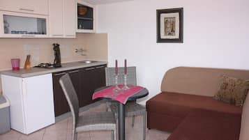 Apartment, 1 Bedroom, Terrace (A2+2 Second Floor) | In-room dining