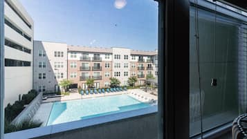 Seasonal outdoor pool, open 7:00 AM to 10:00 PM, pool loungers