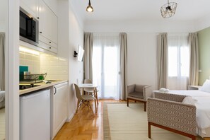 Apartamento Signature, vistas a la ciudad | Ropa de cama de alta calidad y cortinas opacas