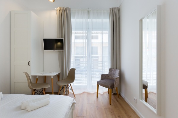Premium bedding, blackout drapes, iron/ironing board, free WiFi