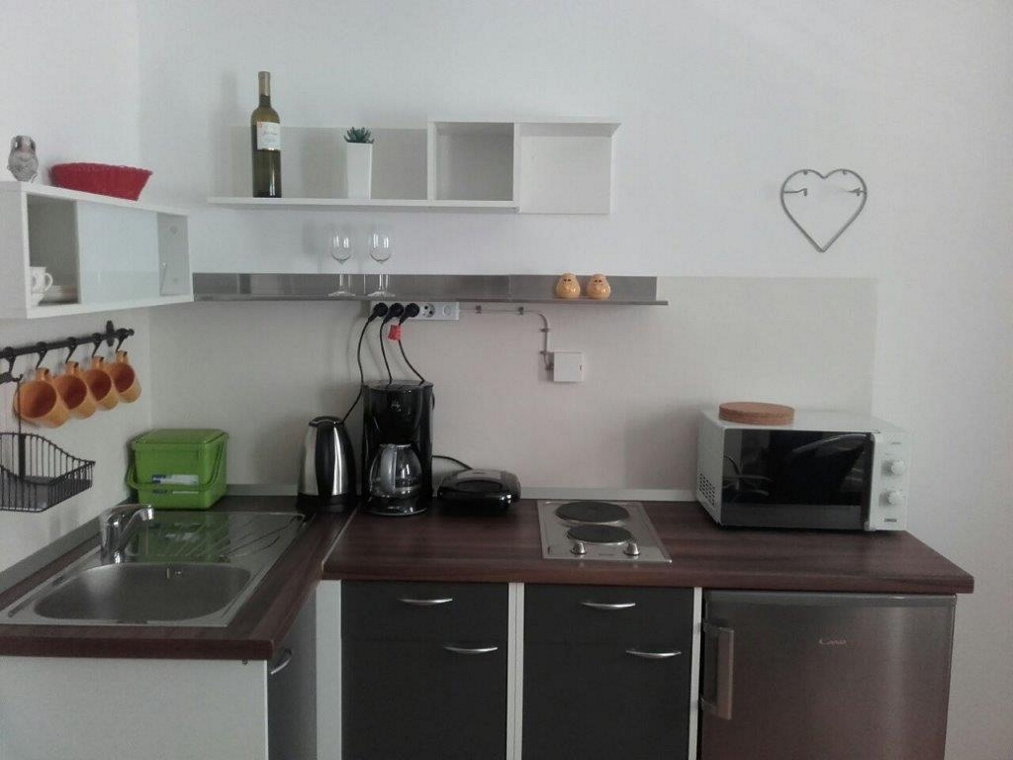 Apartment, 1 Bedroom | Private kitchenette | Fridge, microwave, stovetop, coffee/tea maker