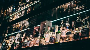 A bar with various bottles of alcohol on shelves. - BOUTIQUE HOTEL11 with rooftop SPA (Nitra)