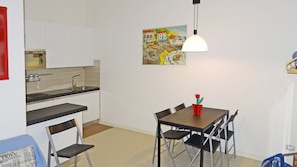 Apartment, 1 Bedroom, Ground Floor (Campione Ora 4) | In-room dining