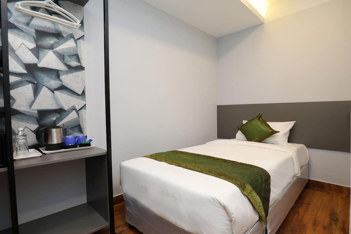Quarto básico, 1 cama de solteiro, para não fumantes | Ferros/tábuas de passar roupa, Wi-Fi de cortesia, roupa de cama