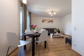 Economy Apartment | Living area | 42-inch flat-screen TV with cable channels, TV - P&O Apartments Obozowa (Warsaw)