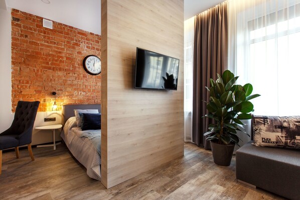 Family Apartment, 1 Queen Bed, Non Smoking | Living area | 108-cm flat-screen TV with cable channels - Old Town Trio Apartments (Vilnius)