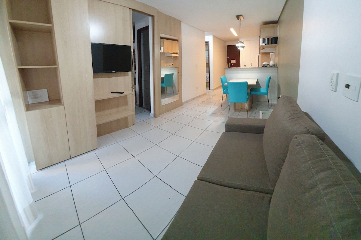 Comfort Apartment | Living area | Flat-screen TV
