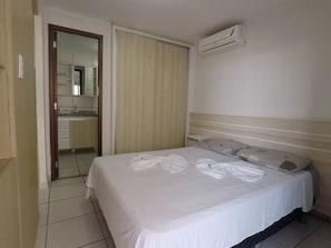 Apartamento conforto | 2 quartos, cortinas blackout, Wi-Fi de cortesia, roupa de cama